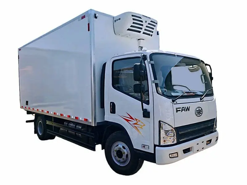 Refrigerated chiller truck delivering fresh catering food in Abu Dhabi for an outdoor event