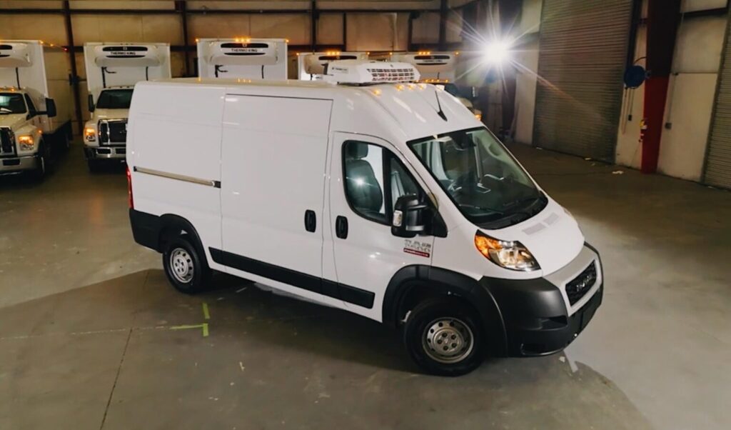 A chiller van in UAE providing refrigerated delivery services for perishable goods.